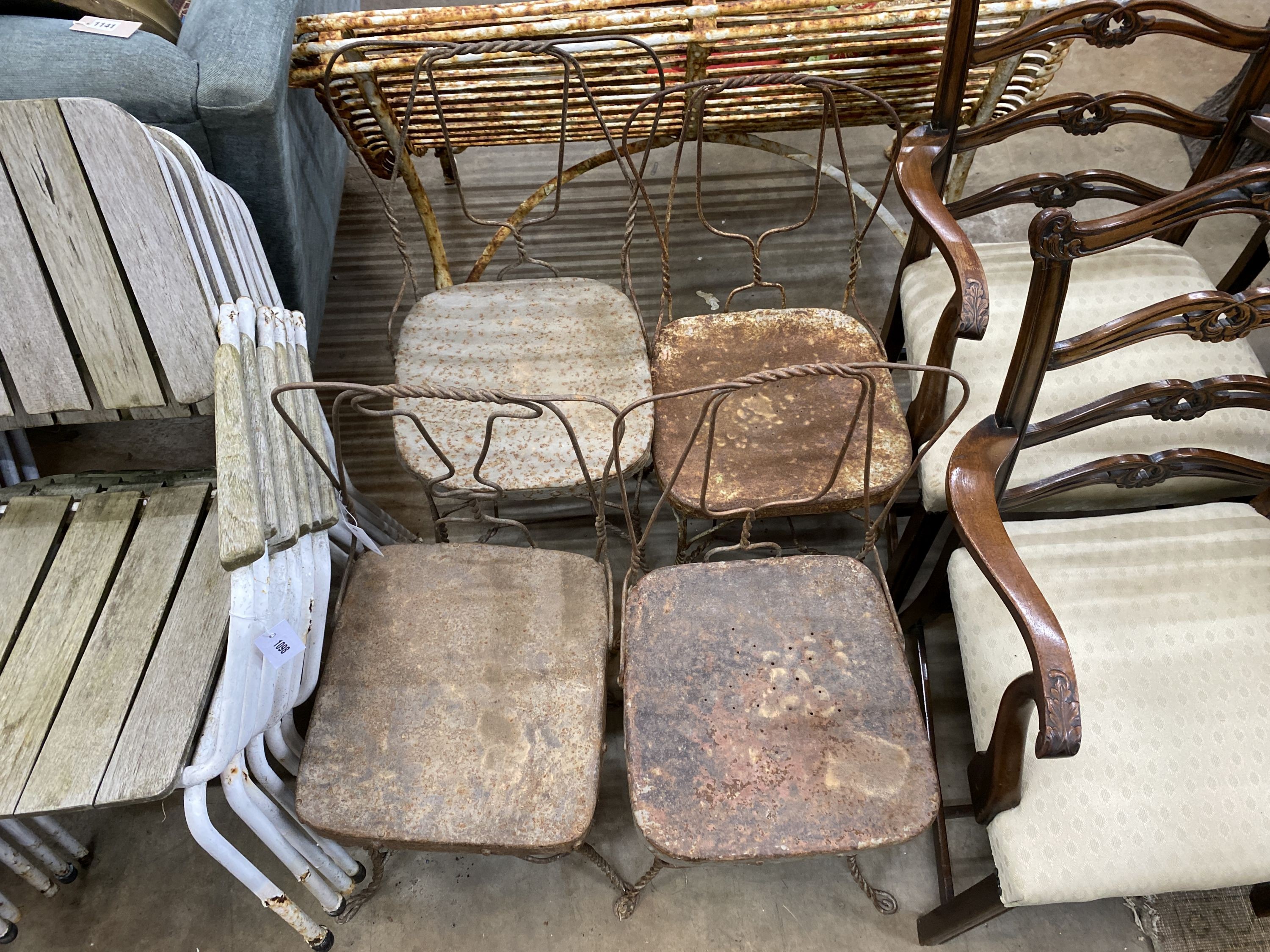 Four vintage wirework garden chairs